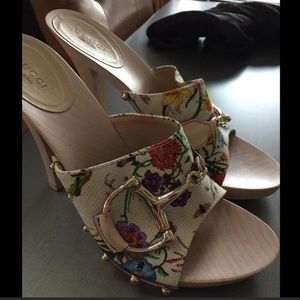 Gucci floral buckle sandals.